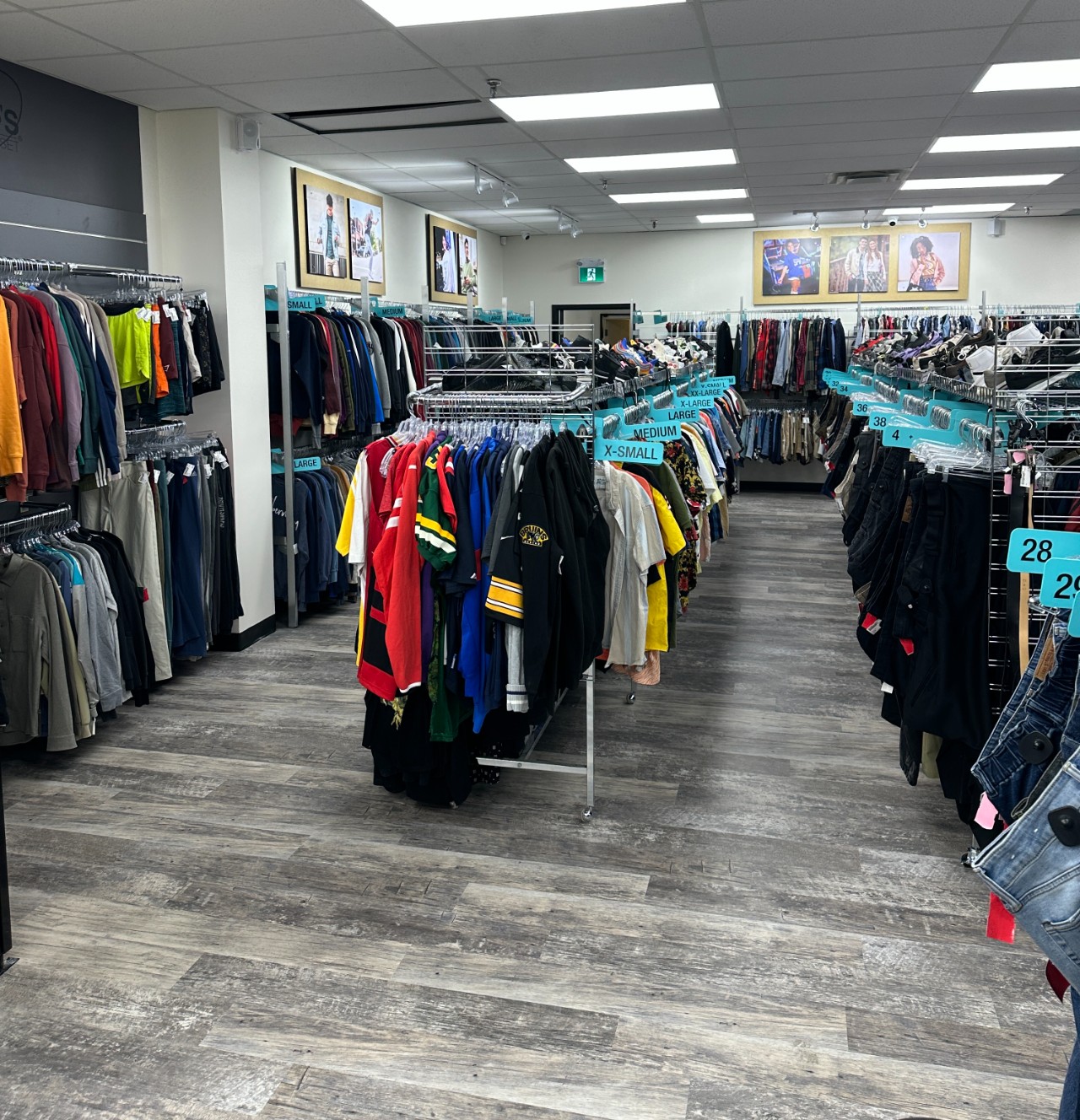 Plato's Closet London South Interior mens section showing racks with clothes